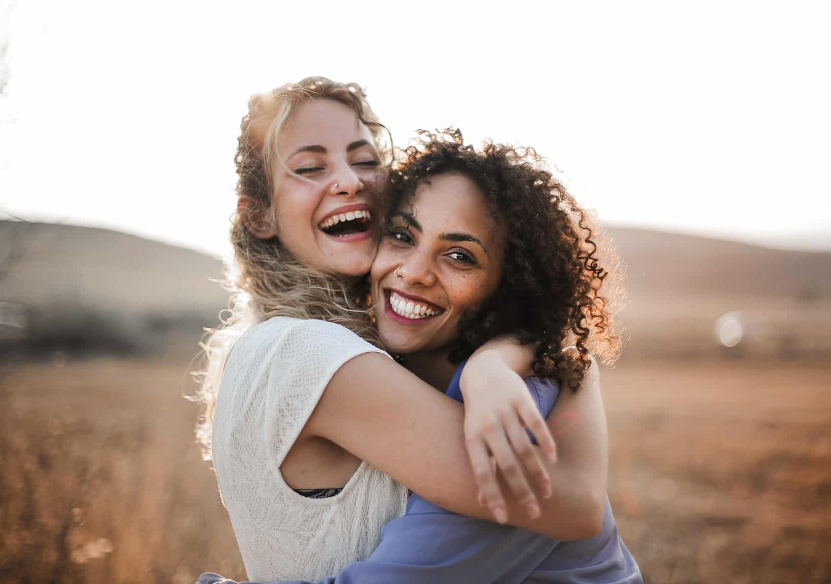 friends hugging midland orthodontics