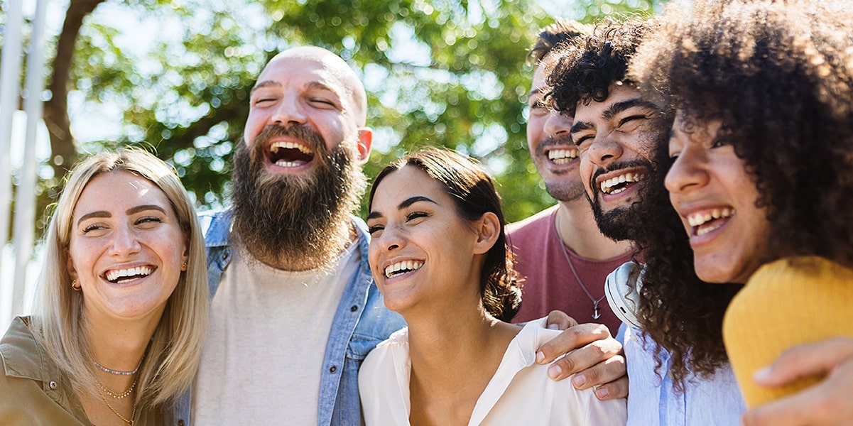 Group smiling with straightened teeth in Poway, CA