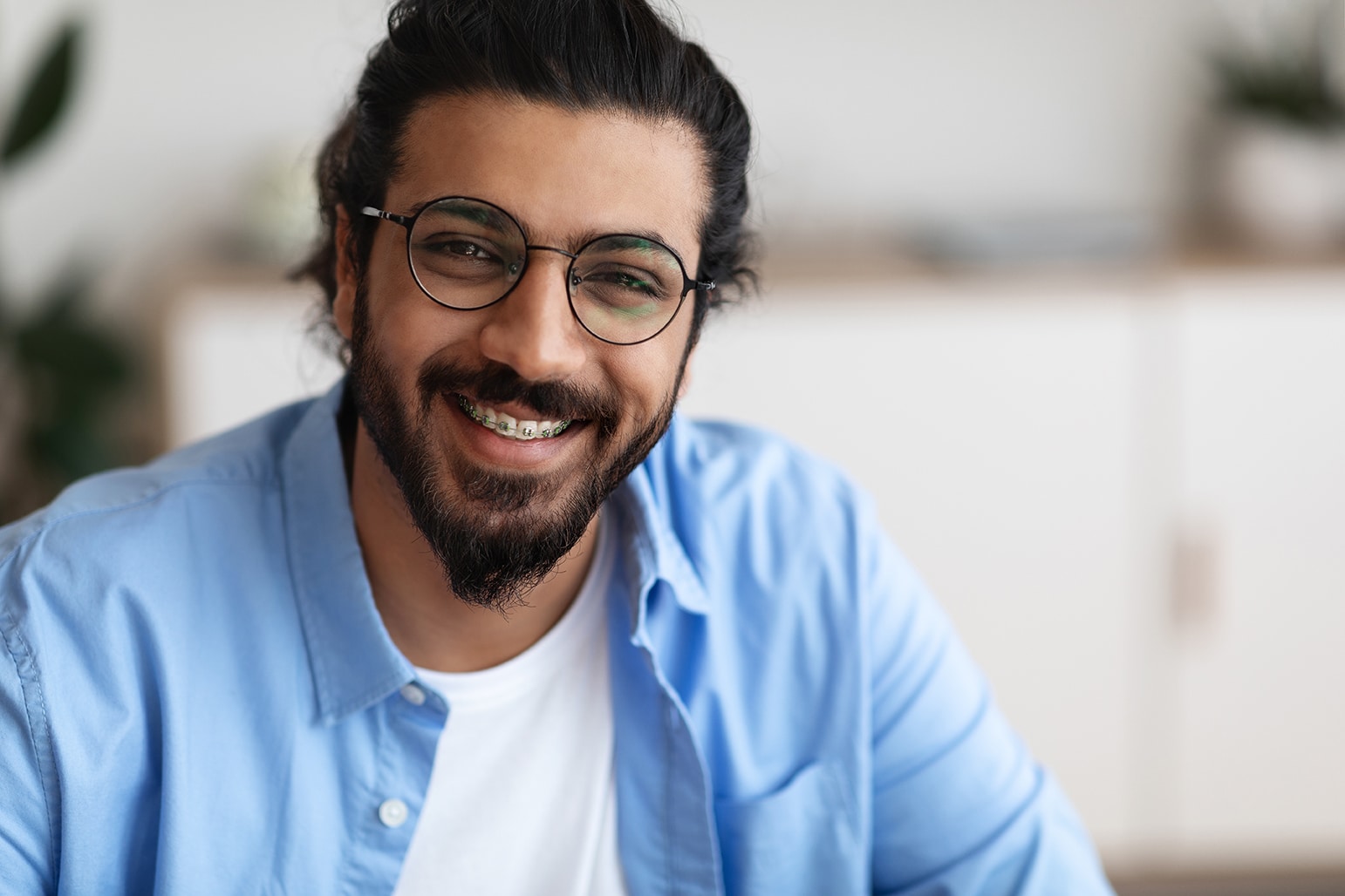 man with braces from midland orthodontics in poway ca